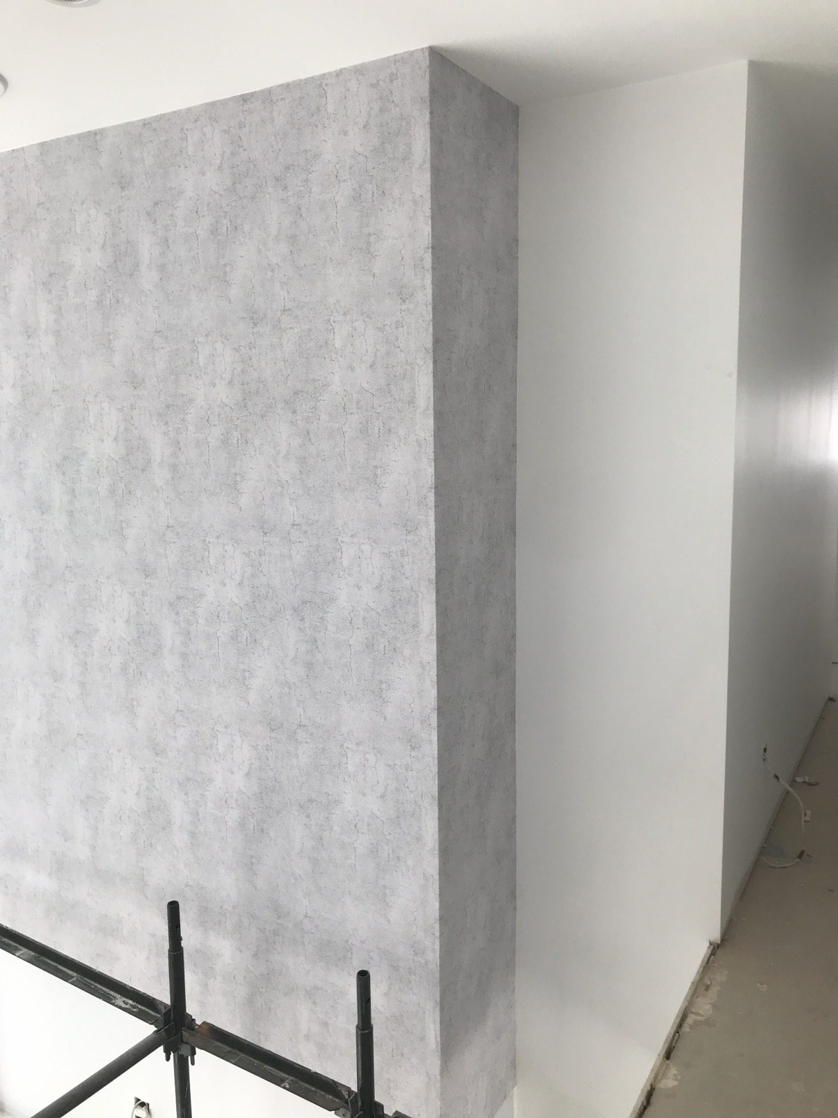 A finished feature wall showing an agreed colour and texture
